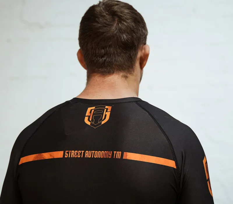 rashguard_long_street_aut_1-3.webp Męskie Street Autonomy Męskie>RASHGUARD LONG FAME BLACK/ORANGE 2022